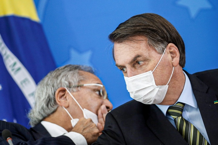 Guedes e Bolsonaro: tema de novo imposto voltou ao centro das discussões por causa do projeto da reforma tributária, que deve ser enviado ao Congresso Nacional na semana que vem (Adriano Machado/Reuters)